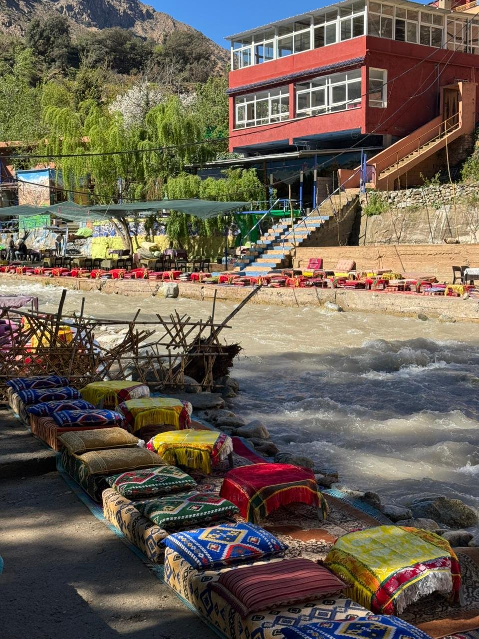 Riverside cushions and low tables along the Ourika river near Setti Fatma